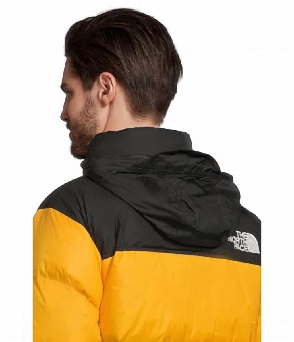 The North Face Yellow and Black Colorblock Puffer Jacket