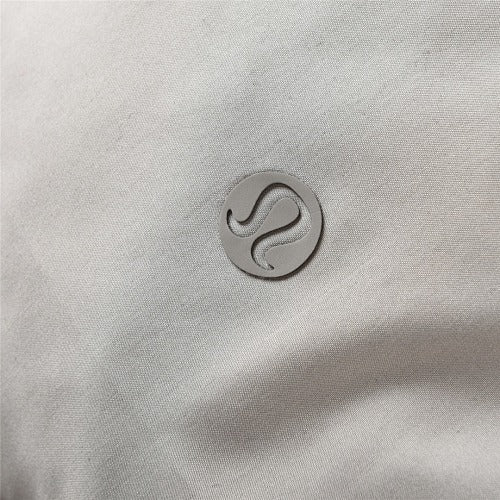 lululemon Cropped Puffer Jacket in Light Greige with Hood and Tonal Logo