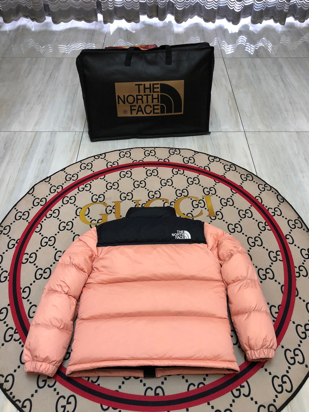 The North Face Peach Pink and Black Colorblock Puffer Jacket