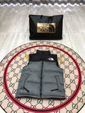 The North Face Puffer Vest in Gray and Black with Stand Collar