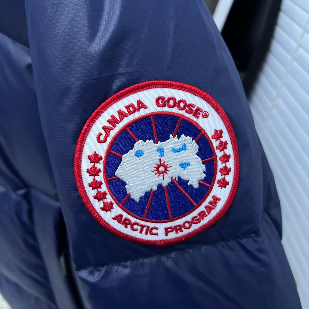 Canada Goose Hooded Puffer Jacket in Navy Blue with Classic Logo Patch