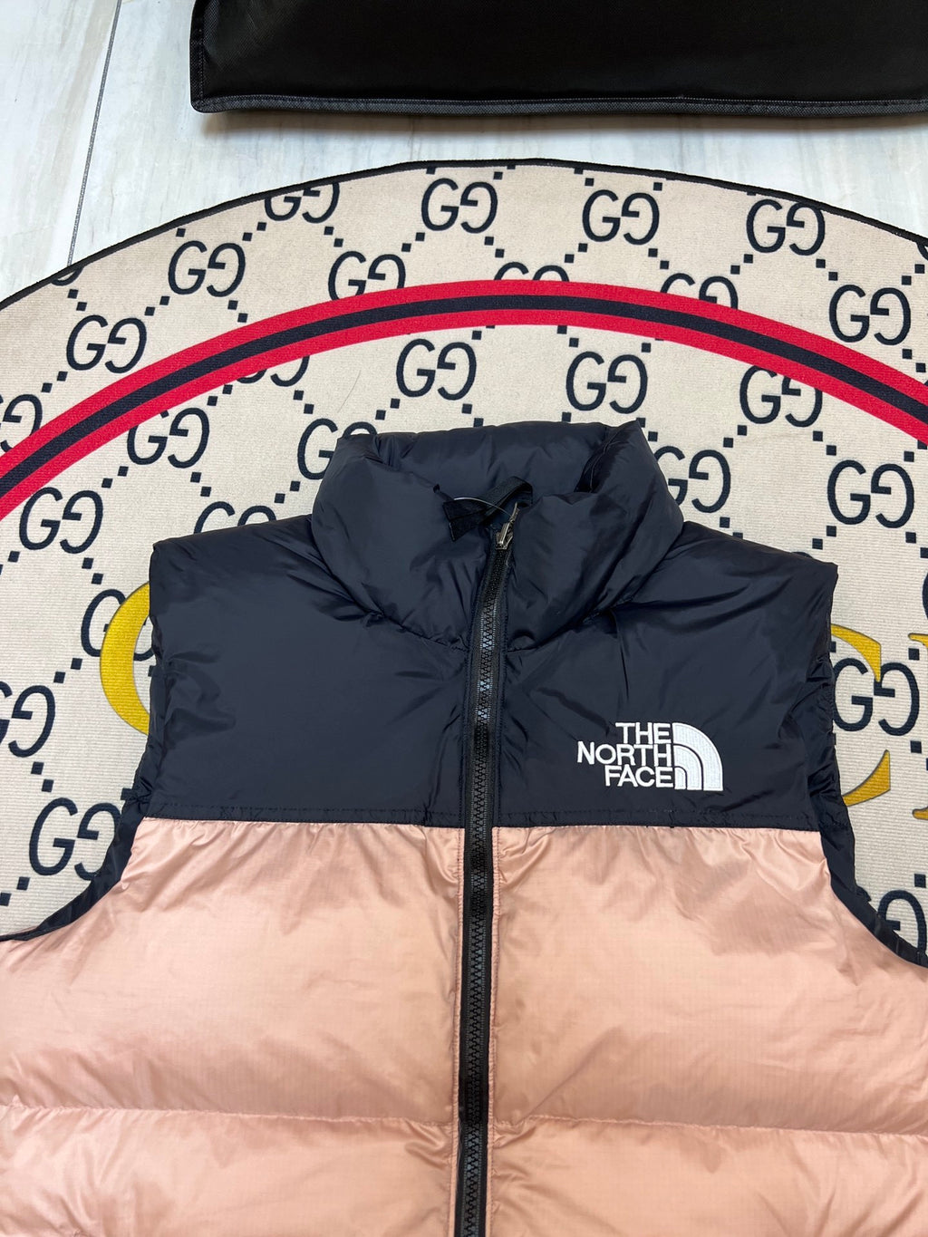 The North Face Puffer Vest in Blush Pink and Black with Stand Collar