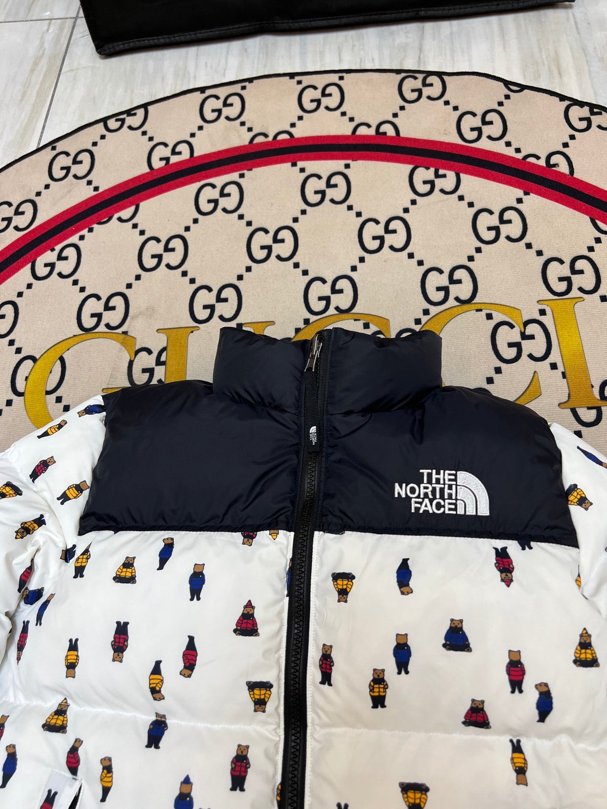The North Face White and Black Bear-Print Puffer Jacket