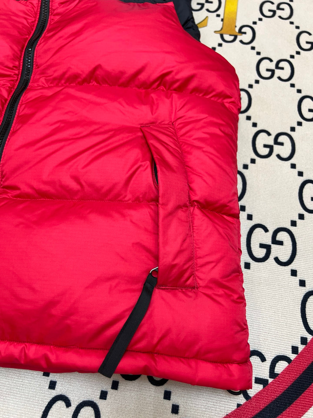 The North Face Puffer Vest in Red and Black with Stand Collar