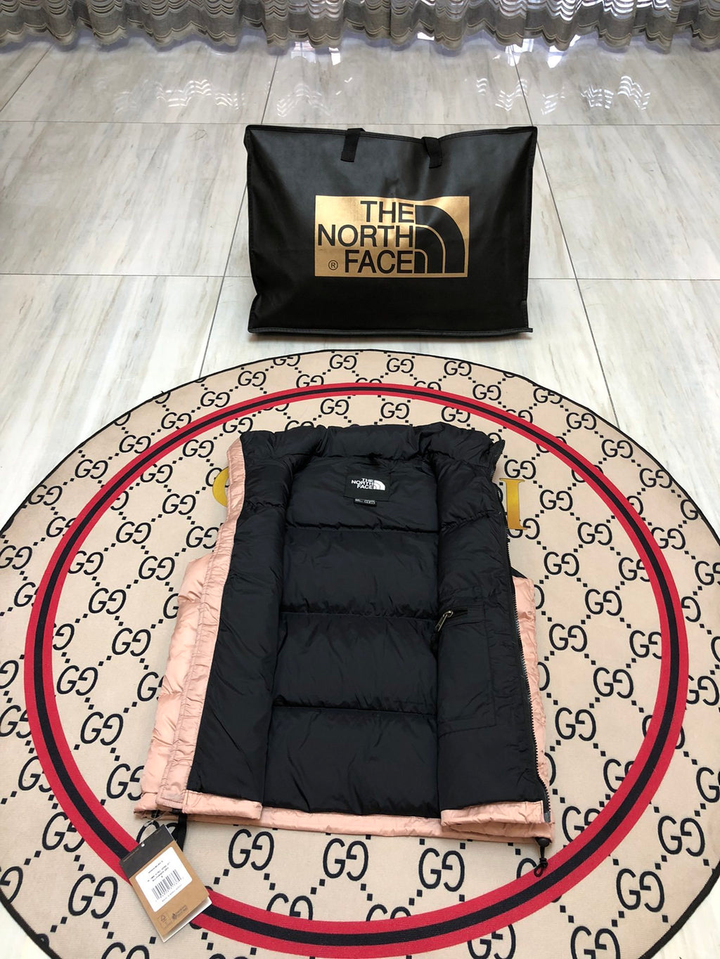 The North Face Puffer Vest in Blush Pink and Black with Stand Collar