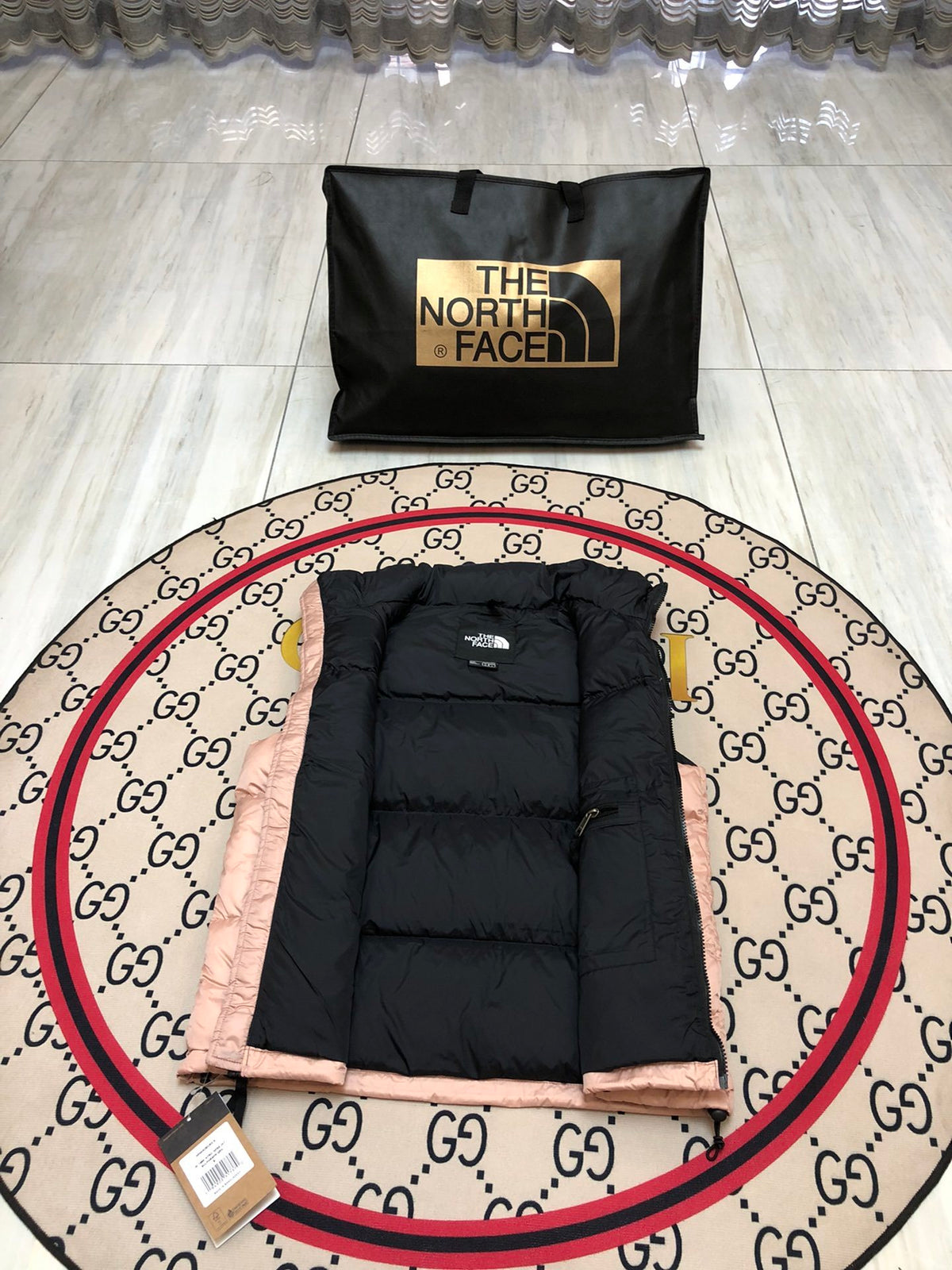 The North Face Puffer Vest in Blush Pink and Black with Stand Collar