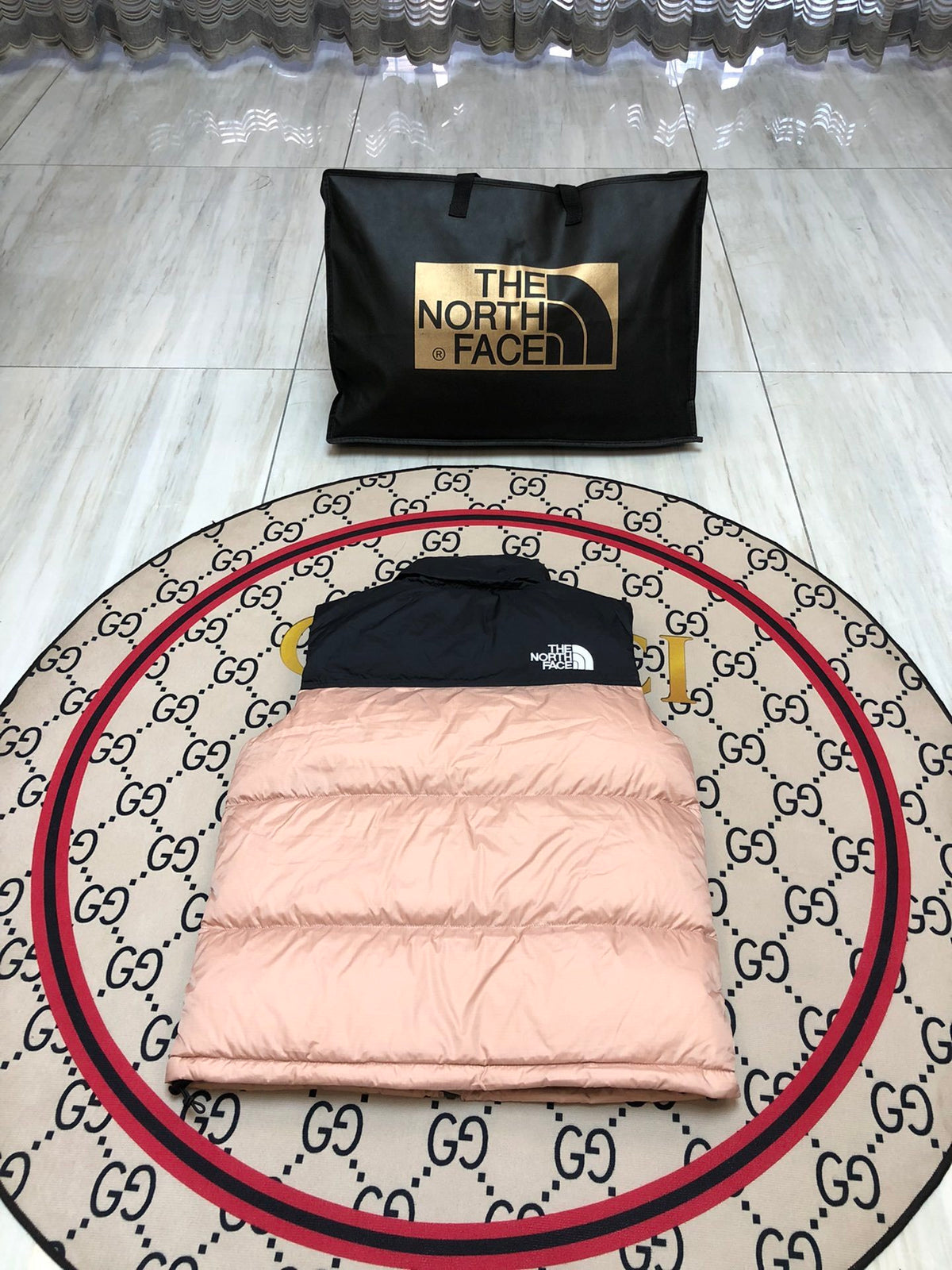 The North Face Puffer Vest in Blush Pink and Black with Stand Collar