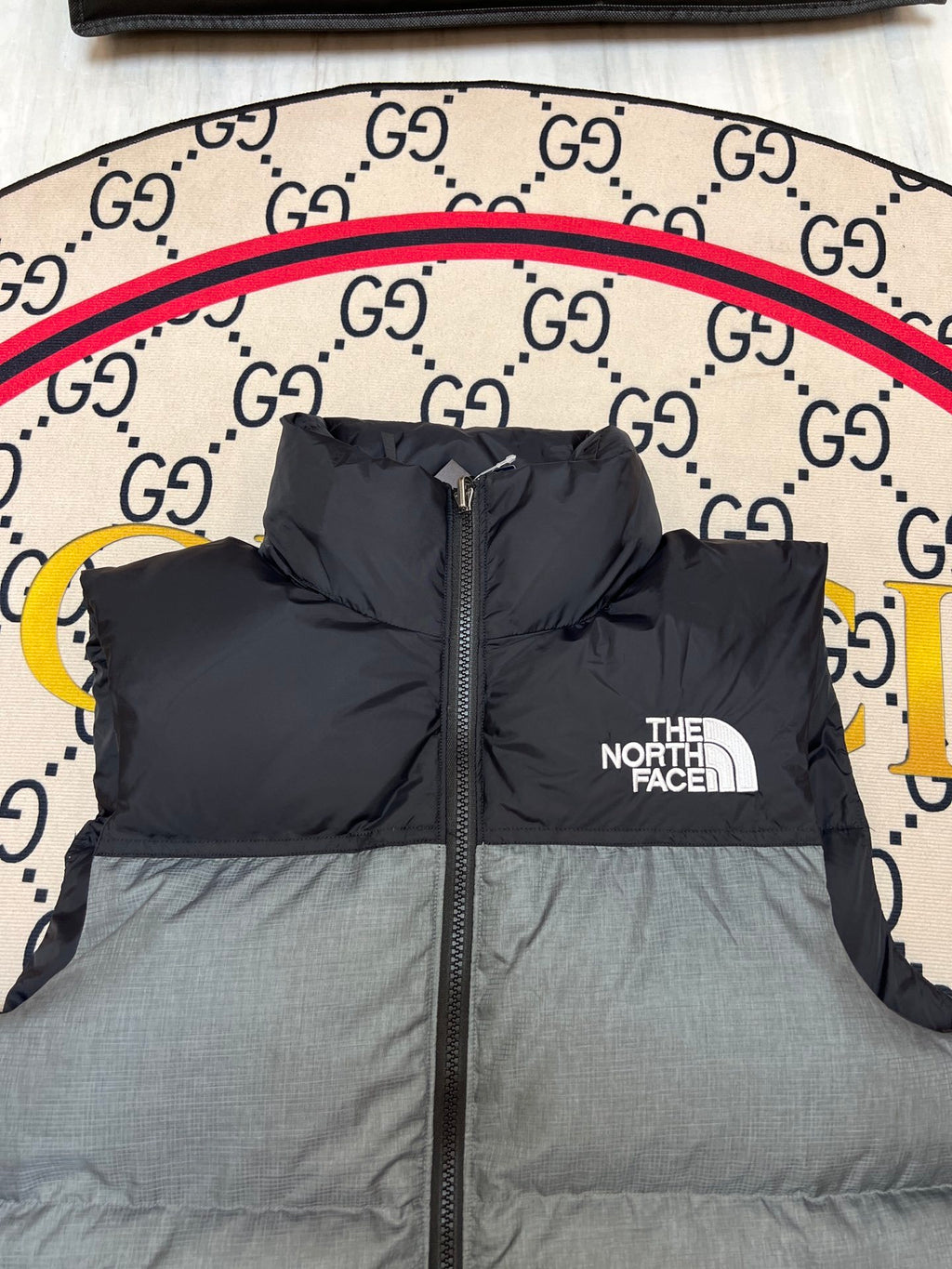 The North Face Puffer Vest in Gray and Black with Stand Collar