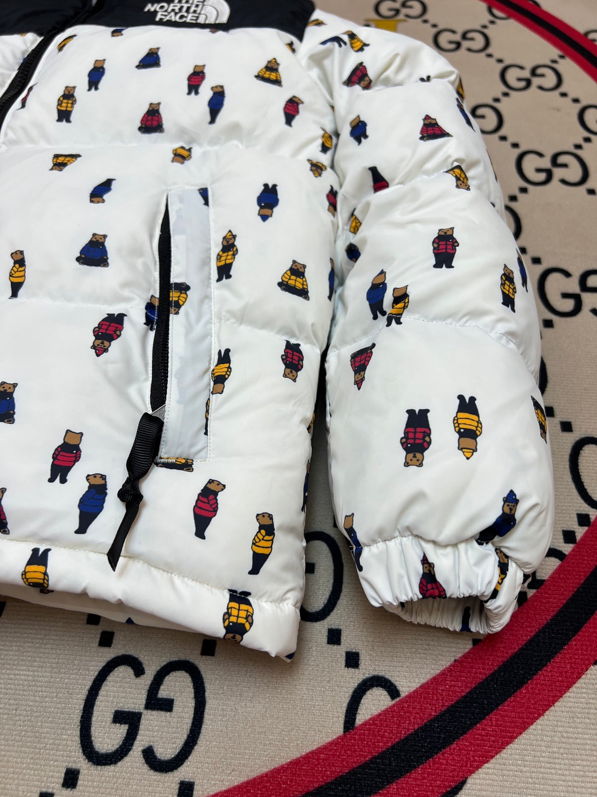 The North Face White and Black Bear-Print Puffer Jacket