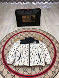 The North Face White and Black Bear-Print Puffer Jacket