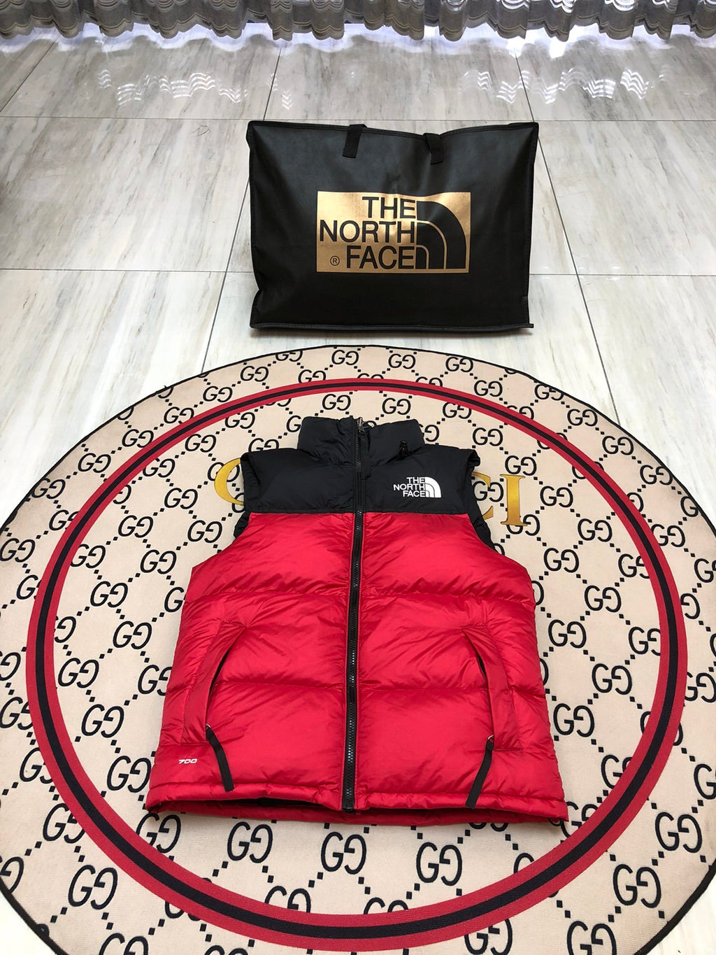 The North Face Puffer Vest in Red and Black with Stand Collar