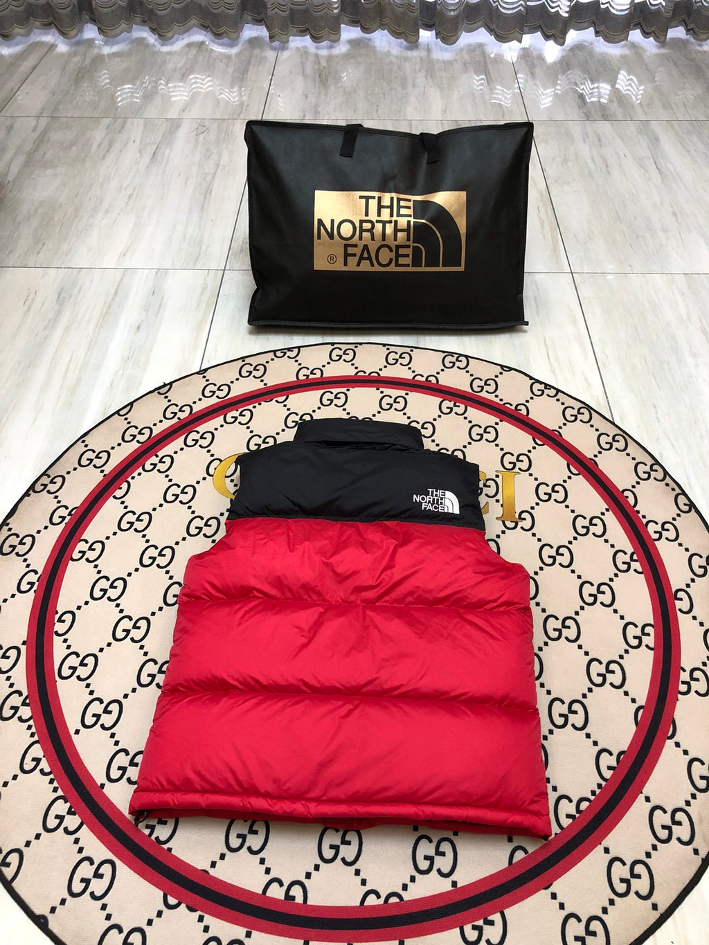 The North Face Puffer Vest in Red and Black with Stand Collar