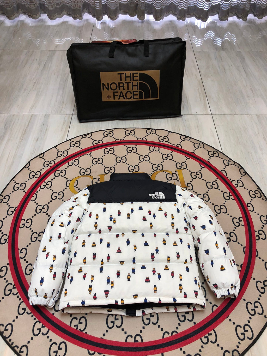 The North Face White and Black Bear-Print Puffer Jacket